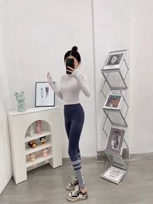beige long sleeve sportswear with pad