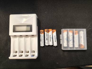 Sony Charger and 8 Rechargeable Batteries