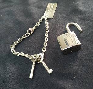 Padlock, key and chain