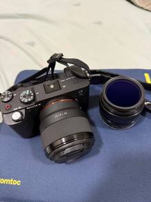 Sony A7C + two lenses (35mm f/1.8 and 50mm f/1.8)