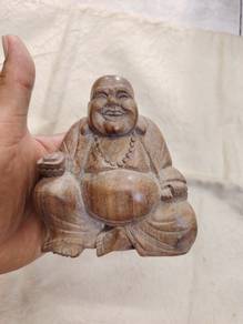 wooden laughing Buddha