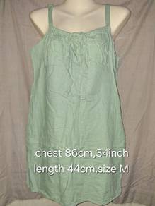 Green sleeveless dress