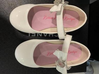 White Mary Janes children’s shoes