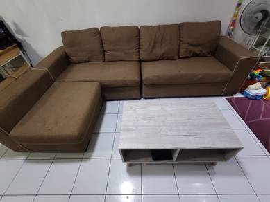 Brown 4-seater sofa with coffee table
