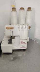 Singer sawing 