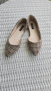 The Houndstooth Check Flats
