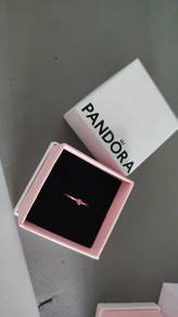 band ring with pink stone
