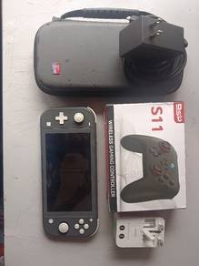 Nintendo switch lite, charger,128gb sdcard and s11