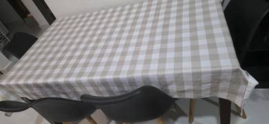Wooden dining table with four chairs