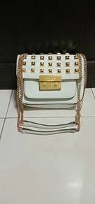 M i c h a e l K o r s Sling Bag Pretty