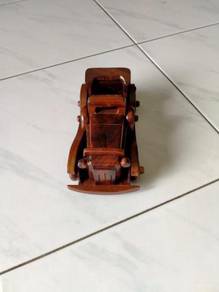 Polished jati wood antique car model