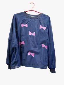 Navy blue sweatshirt with pink bow pattern 