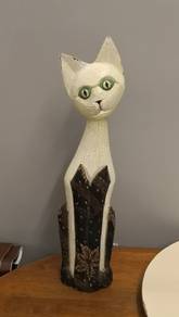 Wooden batik cat statue
