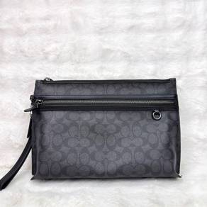 Coach Carry All Pouch in Black Signature Canvas