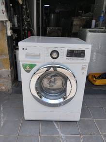 LG 2in1 front load hot washer with dryer 7/4 k