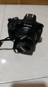 canon mirrorless r100 dan lens