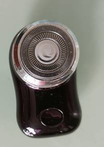Mini electric shaver 4cm X 7cm (Used)