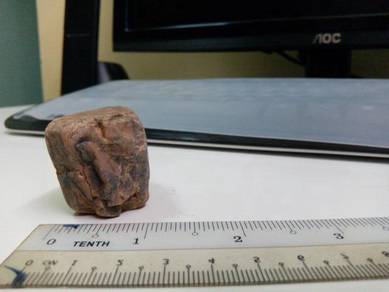A rare stone with a 3D feature of a girl kneeling