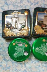 Empty Ireland biscuit tins