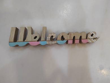 wooden welcome sign