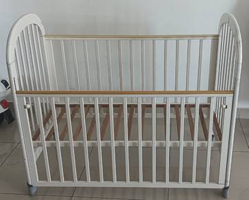 wooden baby cot with bed