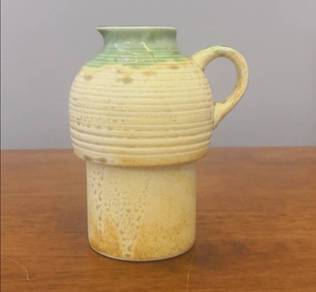 Pottery creamer jar