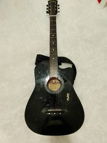 Black Mukita acoustic guitar 