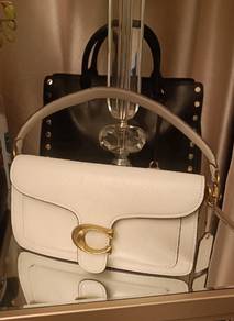 Preloved coach 
