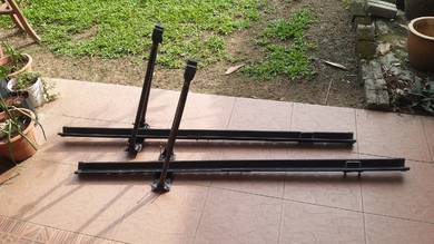Roof rack bicycle carrier.