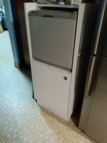 Mini fridge and cupboard