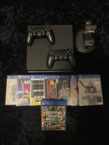 Ps4 Slim 1TB + 2 controller + 9cd games for sell