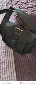 The Tumi Alpha Bravo Compass Flap Crossbody