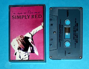 SIMPLY RED - A NEW FLAME CASSETTE Kaset