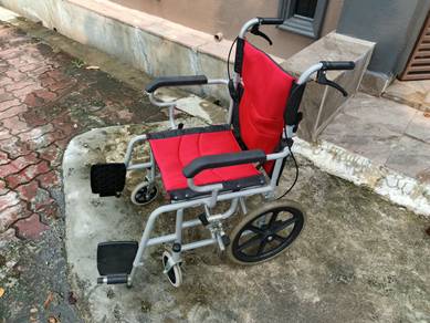 Lightweight Foldable Wheelchair with Red Mesh Seat