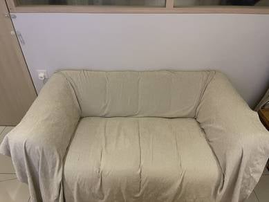 Used 2 seat beige sofa