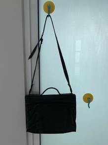 Genuine buffalo skin sling bag.