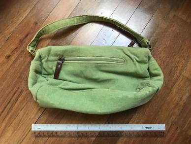 Green corduroy hand bag