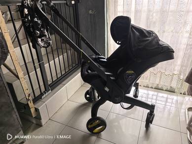 Doona inspired 3 in 1 stroller yellow black