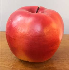 large plastic fake apple