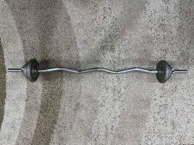 Curl barbell with weight plate