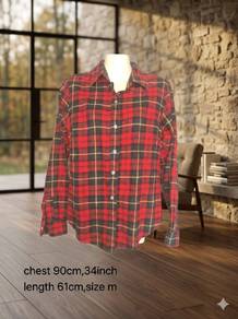 Red and black plaid flannel shirt