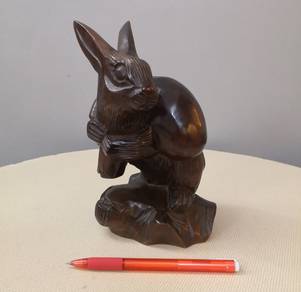 Wooden rabbit figurine