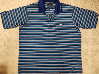 Original Greg Norman polo jersey
Size L pit 21x28
