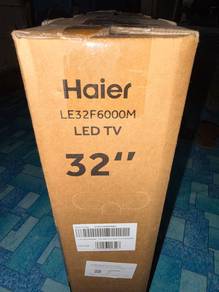 TV baru , masih dalam kotak.