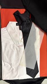 a suit (white t-shirt)with pants and tie