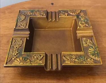 Ornate iron ashtray