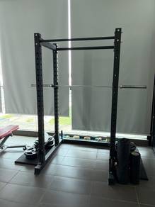 Commercial Power Rack with barbell and weight