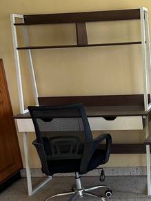 Study table With an office rotating chair.