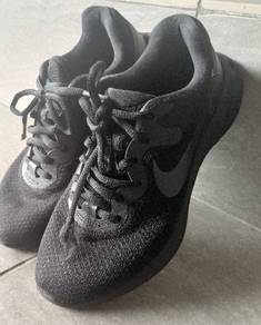 Nike Black running shoe (Kid's shoe)