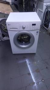 LG front load hot washer washing machine 7 kg